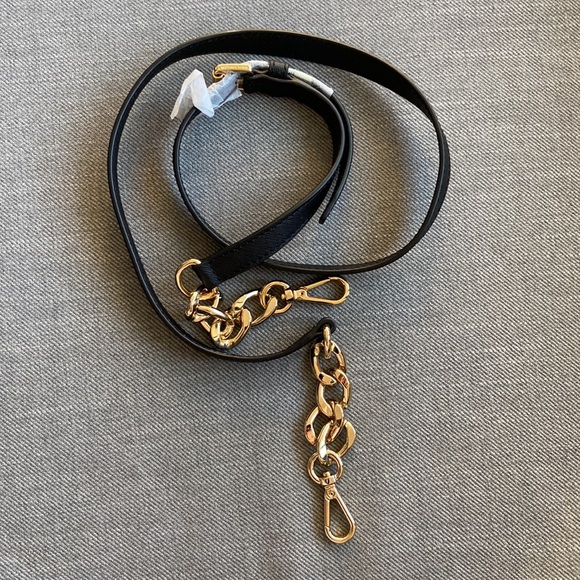 Black Michael Kors bag with key holder and extra chain. - Picture 5 of 6